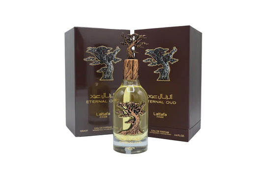 Lattafa Eternal Oud con decorazione a forma di albero sul flacone e confezioni marroni.