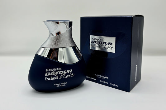 Dettaglio bottiglia Al Haramain Detour Noir profumo mela lavanda gelsomino vaniglia
